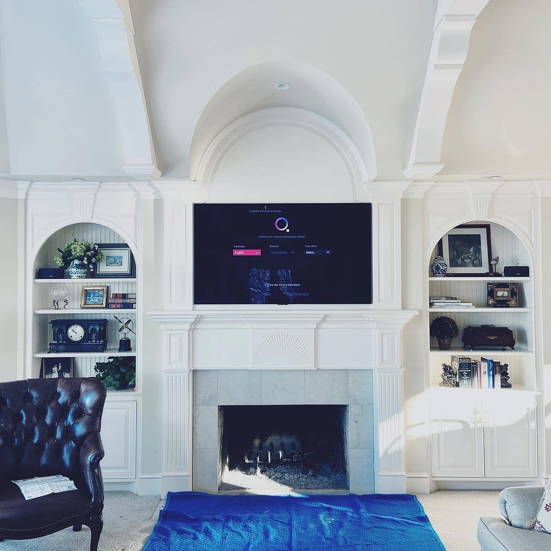 TV mounted on wall TV mounted on wall