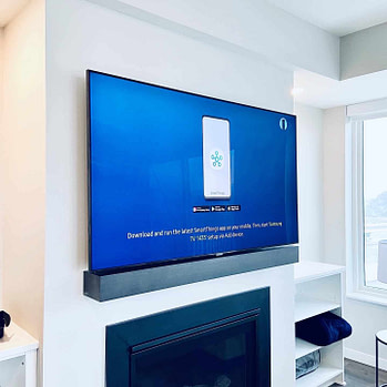 TV mounted on wall TV mounted on wall