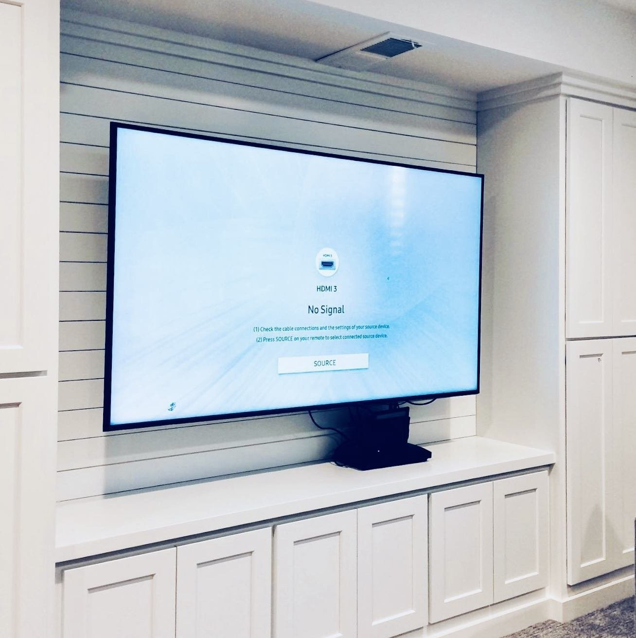 TV mounted on wall TV mounted on wall